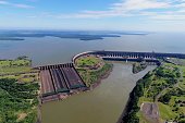 Aerial view of Itaipu's Dam, Foz do Iguaçu, Paraná, Brazil. Great landscape. Energy generation. Hydroelectric scene.
