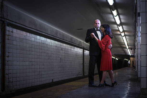 istock Elegant couple romantic moment in a subway station 1200609020
