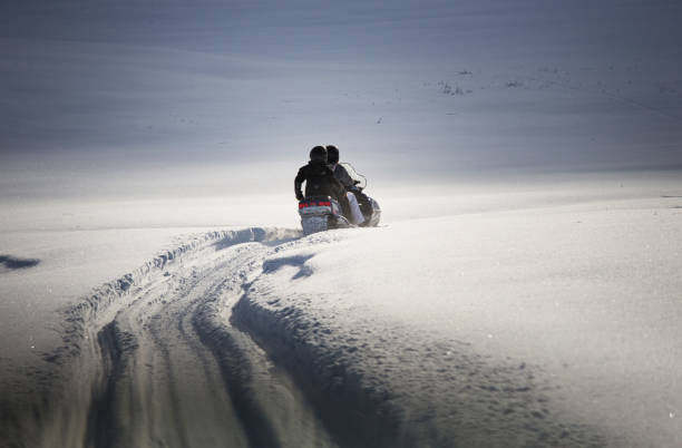 istock Driving snowmobile in Colorado, USA 1200609601