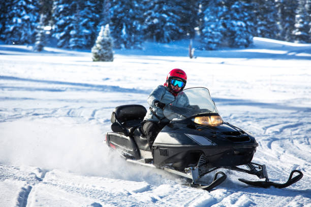istock Driving snowmobile in Colorado, USA 1200609739