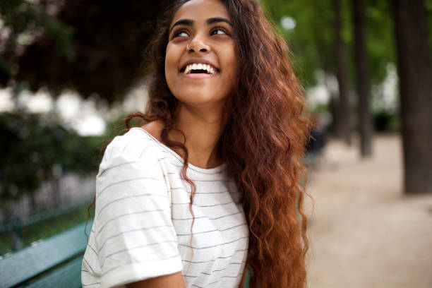 Beautiful Young Indian Woman Laughing In Park Stock Photo - Download Image Now - Women, One Woman Only, Indian Ethnicity - iStock Beautiful Young Indian Woman Laughing In Park Stock Photo - Download Image Now - Women, One Woman Only, Indian Ethnicity - iStock