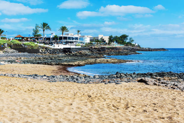 istock Las Cucharas beach in Costa Teguise, Lanzarote 1200611251