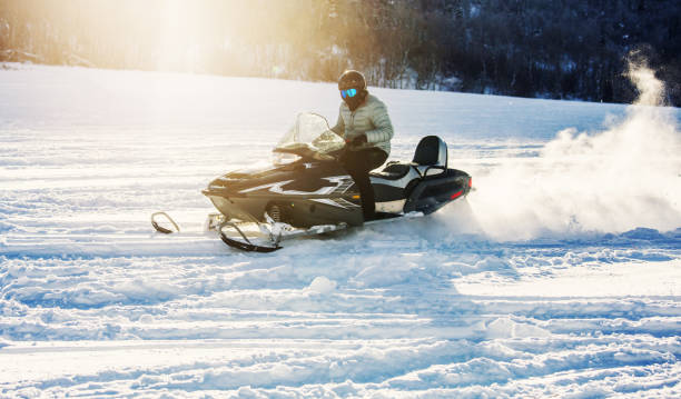 istock Driving snowmobile in Colorado, USA 1200613860