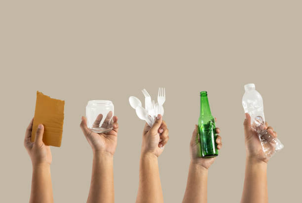 istock recycle  different types of garbage Ecology concept holding garbage bottle plastic and glass to types of garbage 1200616754
