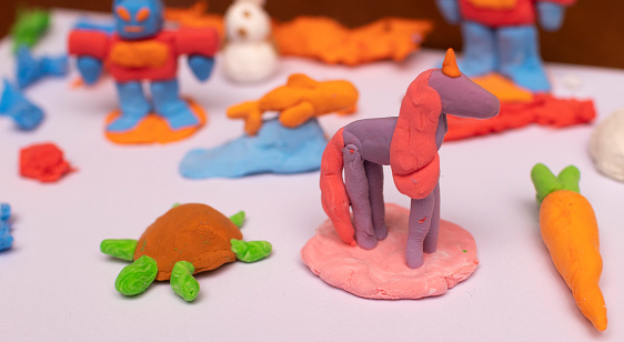 Plasticine unicorn, carrot, robot, turtle and fish