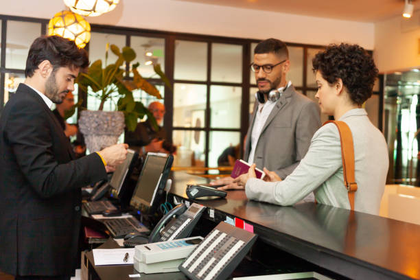 istock modern young people in a hotel reception 1200621260