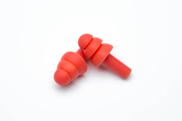 istock Isolated of Red earplug on white background 1200627368