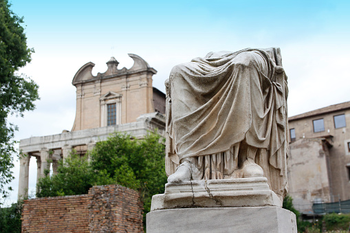 Statue with half body at Temple of Vesta and the House of the Vestal Virgin in Roman Forum, Rome, Italy