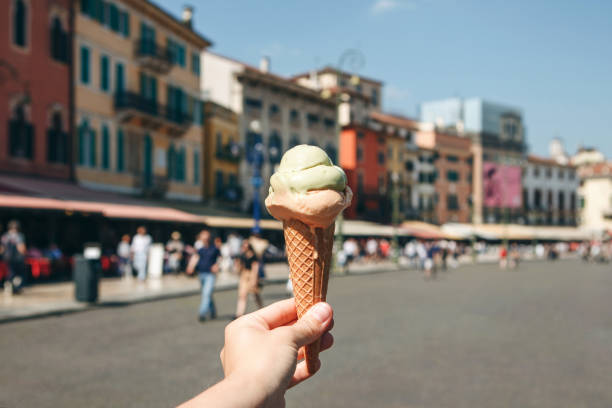 istock Female hand holds ice cream 1200633598