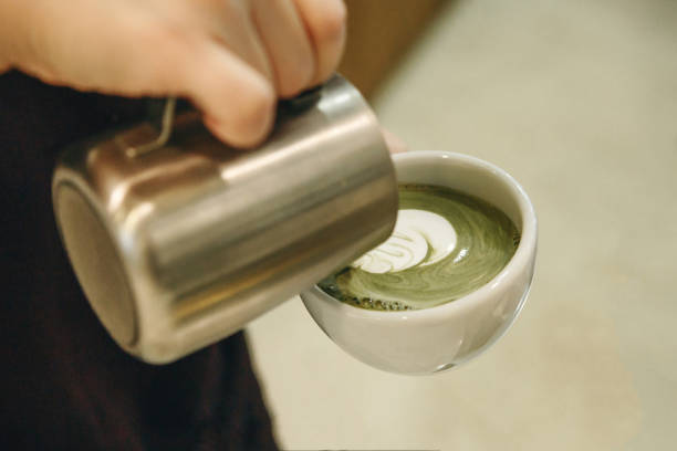 istock Barista prepares matcha latte tea 1200637494