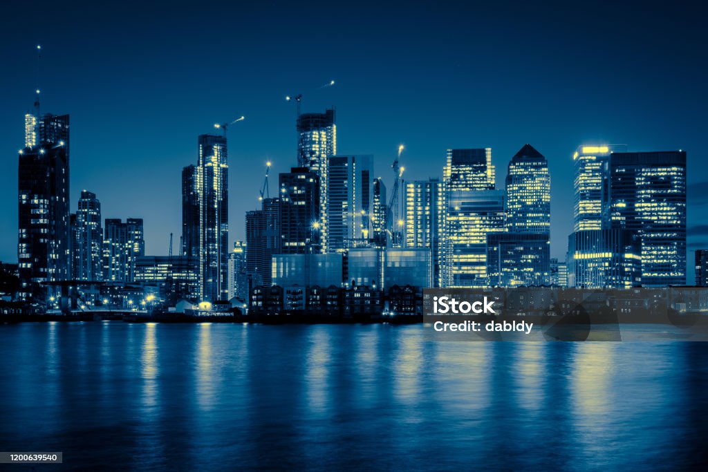 Canary Wharf Business District Skyline at Night Night Time Skyline View of Modern Business District Canary Wharf in London, UK. Canary Wharf Stock Photo