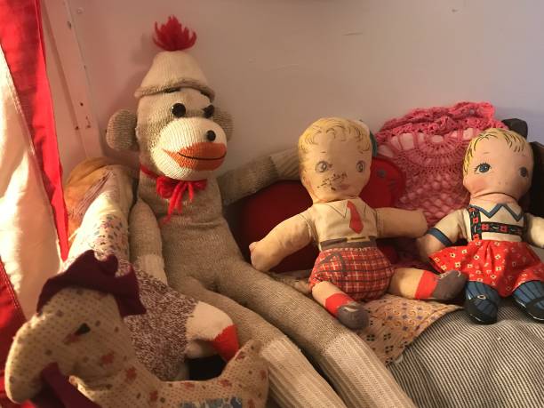 istock Antique Dolls and Sock Monkies 1200641536