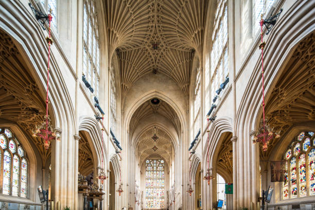 Interior of Bath Abbey in Bath Interior of Bath Abbey in Bath, Somerset, United Kingdom bath abbey stock pictures, royalty-free photos & images