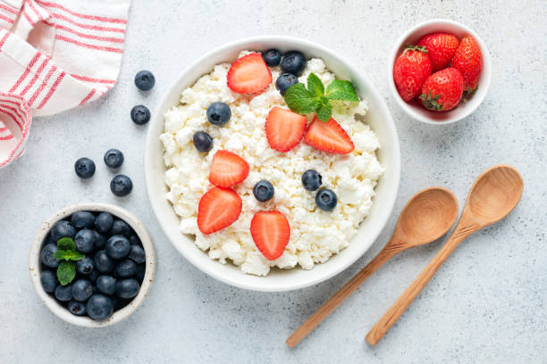 istock Cottage cheese, curd cheese with berries 1200644685