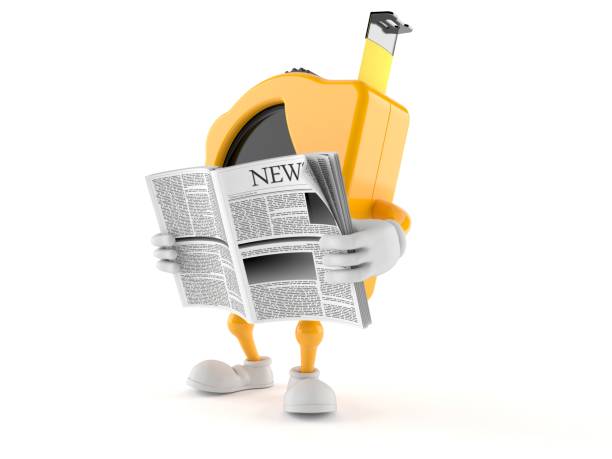 istock Measure tape character reading newspaper 1200647989