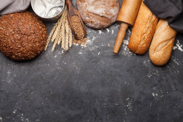 istock Various bread with wheat, flour and cooking utensils 1200651263