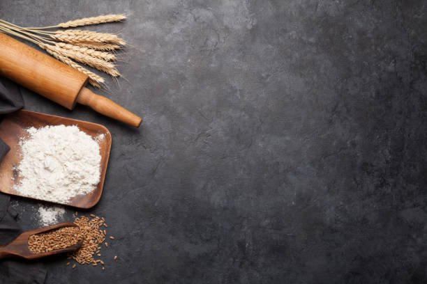 istock Various bread ingredients. Wheat, flour and cooking utensils 1200651449