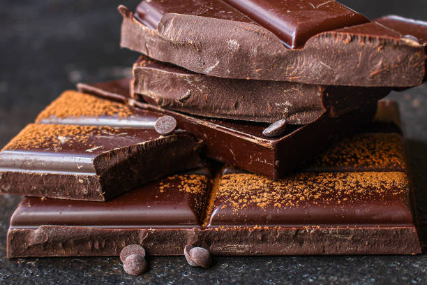 istock chocolate (delicious cocoa dessert, pieces of sweets) menu concept. food background. top view. copy space 1200654051