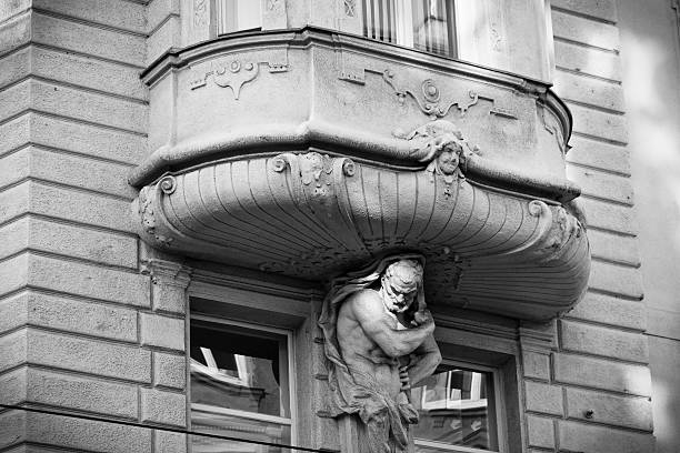 istock Marble Statue Carrying A Balcony, Vienna - B&W 120065541