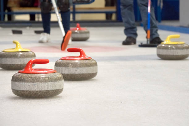 istock Group of stones for curlinggame in curling on ice. 1200658406