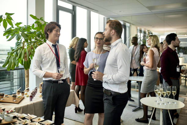 istock Professionals Enjoying Champagne at Business Launch 1200658872
