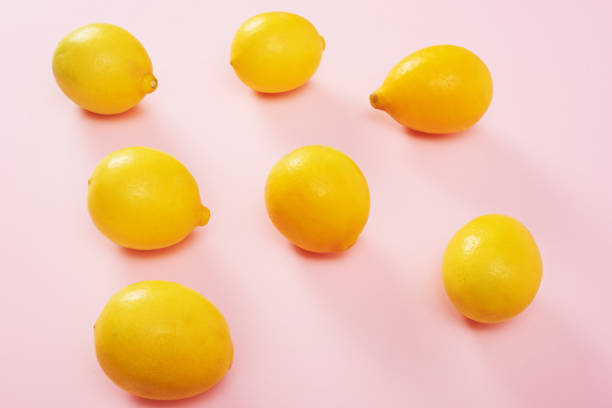 istock Lemons isolated on pink background. High Angle View Of Lemons. Free space for text. 1200668087