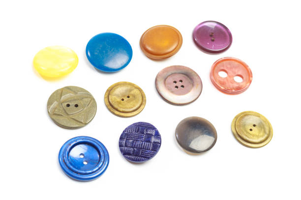 istock Set of vintage cloth button closeup on white background 1200668315