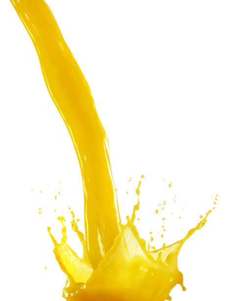 istock Poring Juice with splash,Mango Juice on White Background 1200668784