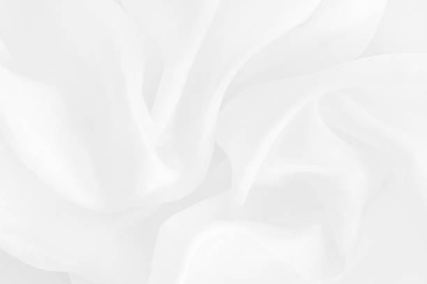 istock White fabric cloth texture for background and design art work, beautiful crumpled pattern of silk or linen. 1200668957