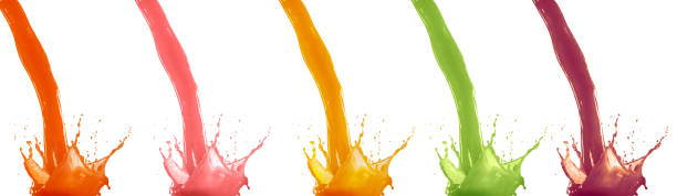 istock Poring Fresh Fruit juice splashes isolated on white background 1200668989