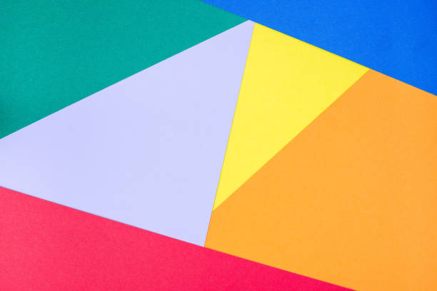 istock Abstract geometrical pattern made from green, violet, blue, red, orange and yellow paper, blank background for template, horizontal,  copy space 1200676504