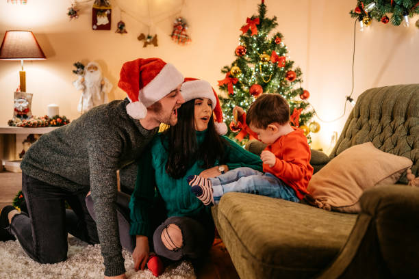 istock Happy parents and their son for Christmas 1200679040