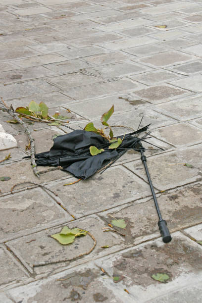 istock broken umbrella in street of Venice 1200679355