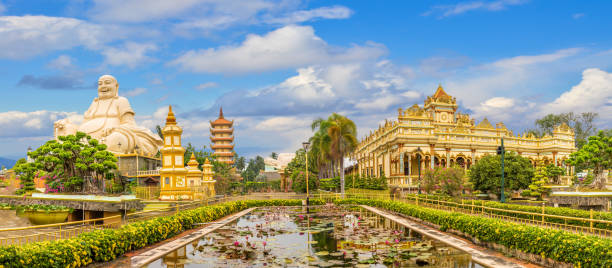 Landscape with Vinh Tranh Pagoda Landscape with Vinh Tranh Pagoda in My Tho, the Mekong Delta, Vietnam monastery religion spirituality river stock pictures, royalty-free photos & images