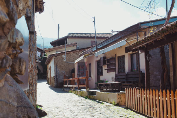 istock Old traditional house on flowing mountain river 1200681057