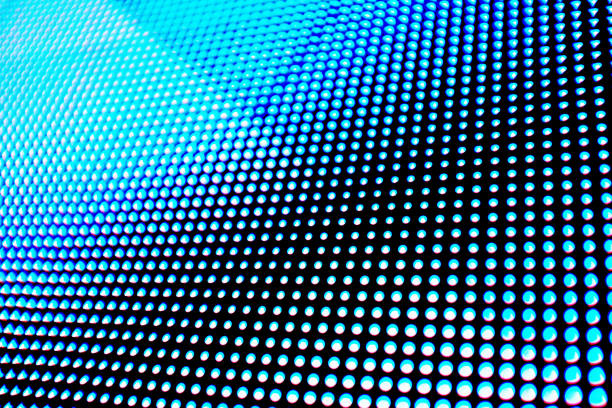 istock Detail of an LED sign, with bright glowing pixels arrayed in a grid pattern of light 1200681213