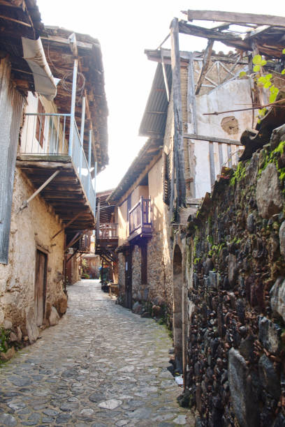 istock Old traditional house on flowing mountain river 1200684496