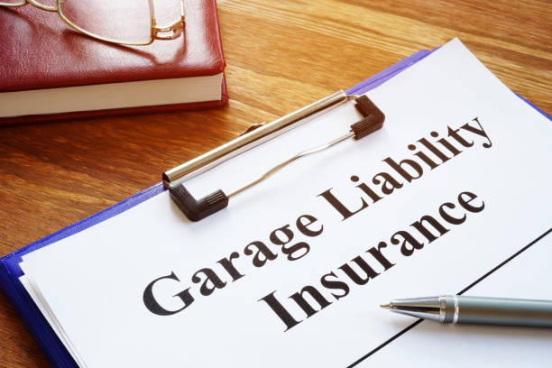 istock Garage Liability Insurance agreement and pen for signing. 1200687561