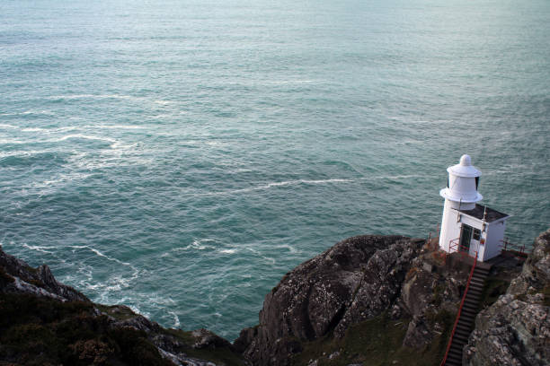 istock Sheep's Head Lighthouse overlooking the tip of Bantry Bay west Cork Ireland 1200688416