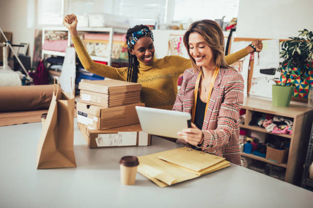 istock Sales Online. Working women at their store. 1200688779