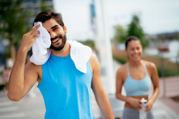 istock Couple relaxing after work out stock photo 1200692571
