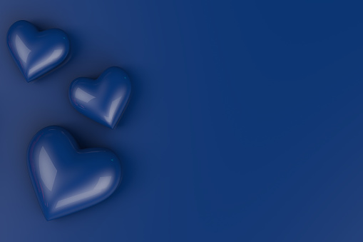 3d rendering of Valentine's Day, concept. Different sized shiny navy hearts lying on blue background Mother's Day or Women's Day postcard, greeting card with copy space.