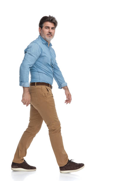 istock Side view of a cheerful casual man moving 1200692986