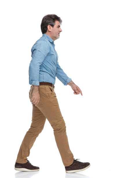 istock Side view of a motivated casual man stepping 1200693018