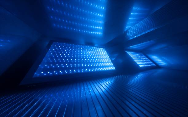 istock 3d render, blue neon abstract background, ultraviolet light, night club empty room interior, tunnel or corridor, glowing panels, fashion podium, performance stage decorations, 1200696094