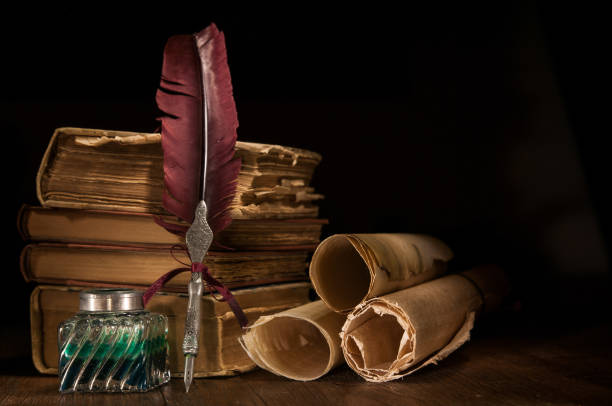 istock Quill pen and old books 1200696555