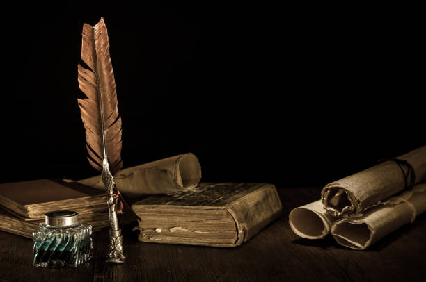 istock Quill pen and old books 1200697814