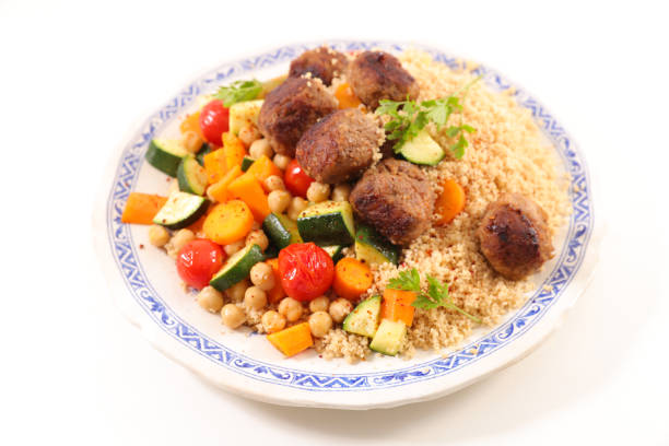 Tabbouleh salad recipe with tomato, cucumber, couscous pepper and citrus juice from middle eastern and Arabic dish, vegetarian vegan food