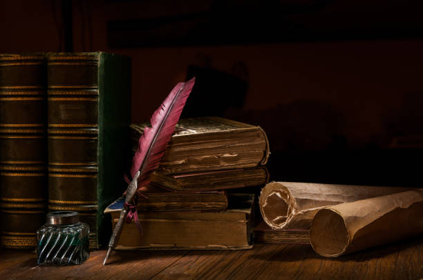istock Quill pen and old books 1200698152