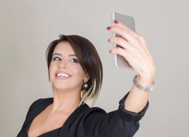 istock Mature woman taking a selfie 1200698445